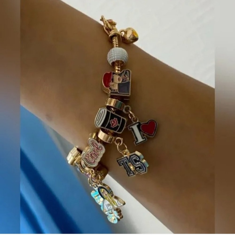 Pandora Gold and Red Charm Bracelet